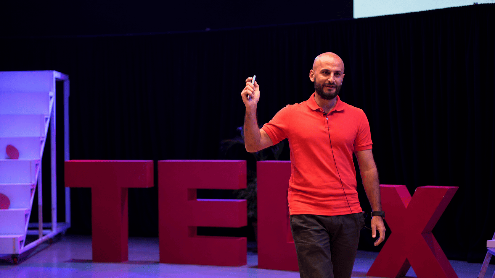 Bill Saddik, Founder of TrackEDU, speaking on the TEDx stage